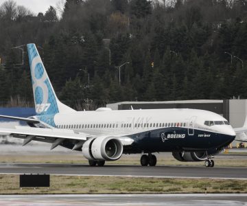 A Boeing 737 Max 8 airliner lands at Boeing Field to complete its first flight on Jan. 29, 2016, in Seattle. The Boeing 737 Max is the fastest-selling plane in the company's histo